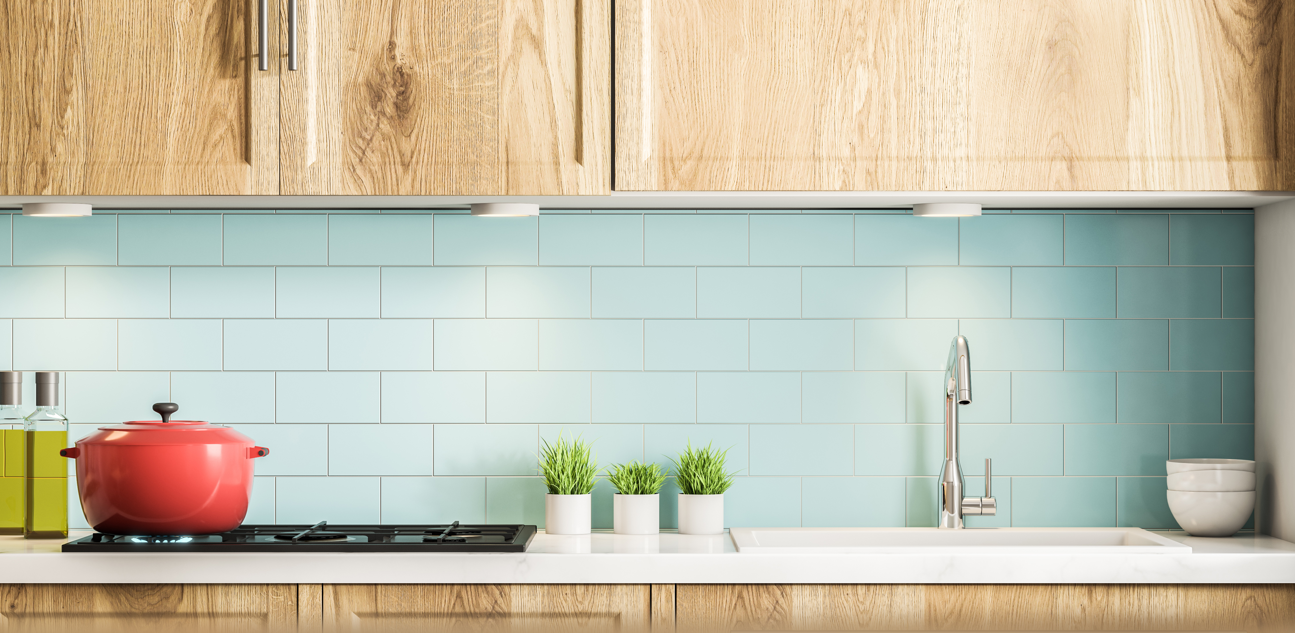 narrow blue subway tile kitchen